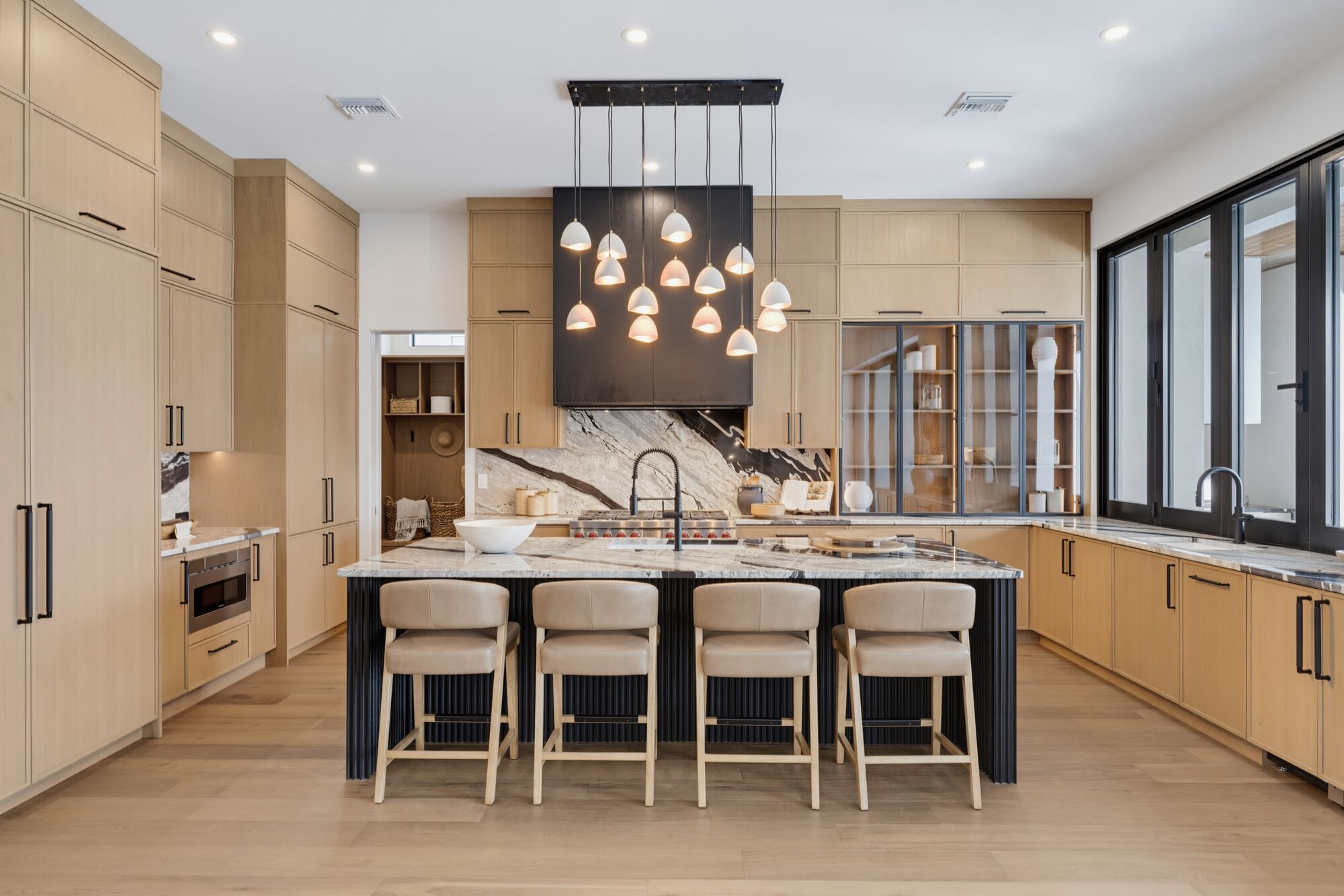 Custom wood kitchen with waterfall island